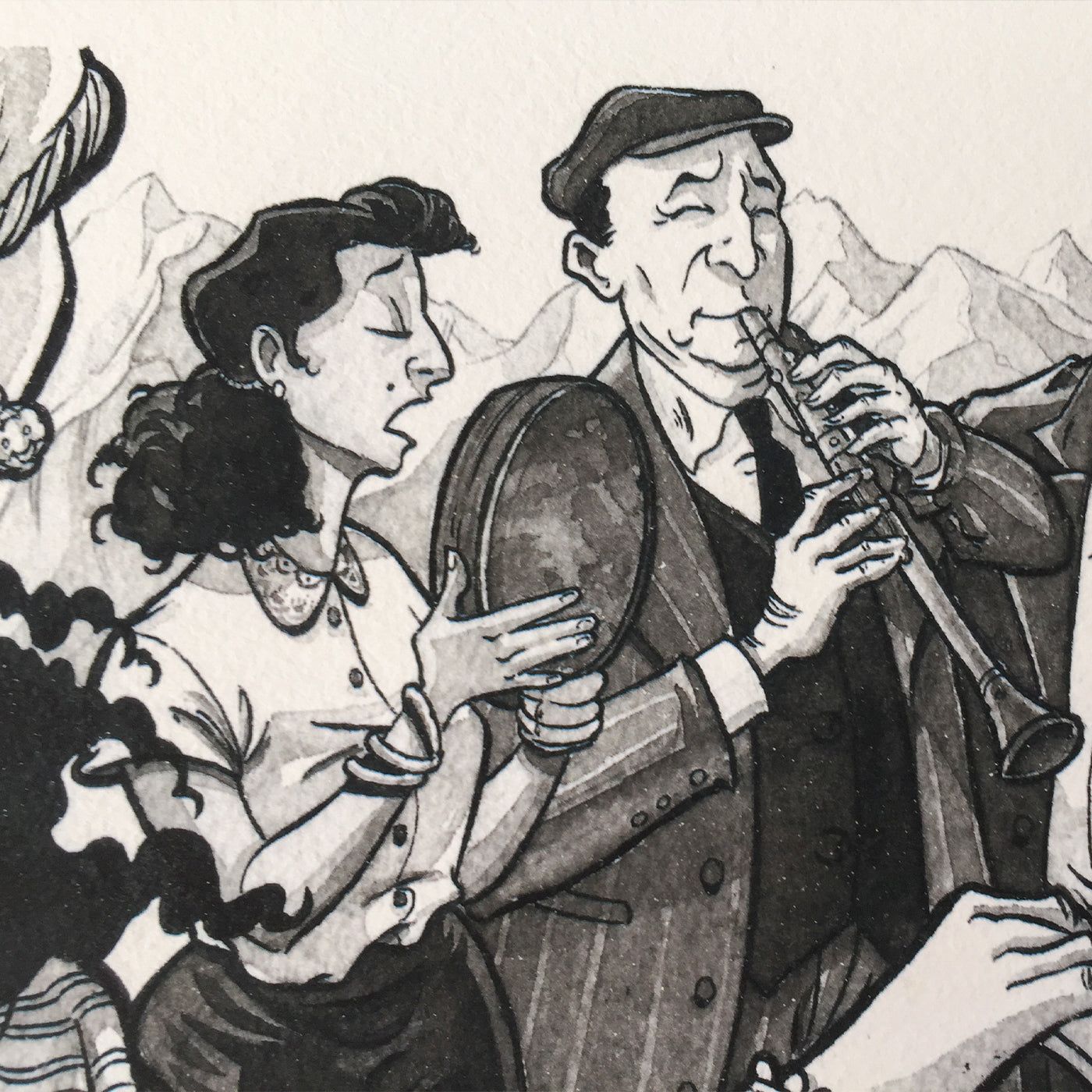 Close up where we have a part of the dancer in the first plan. And a woman playing the defi, amnd a man playing the clarinet.