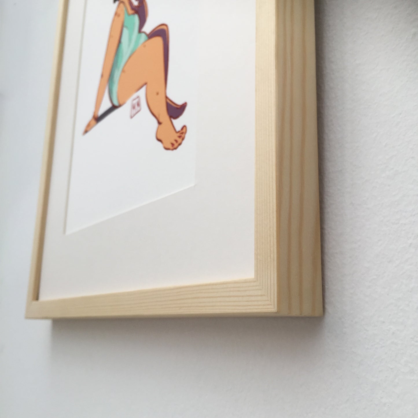 Close up of the handmade frame in pine wood.