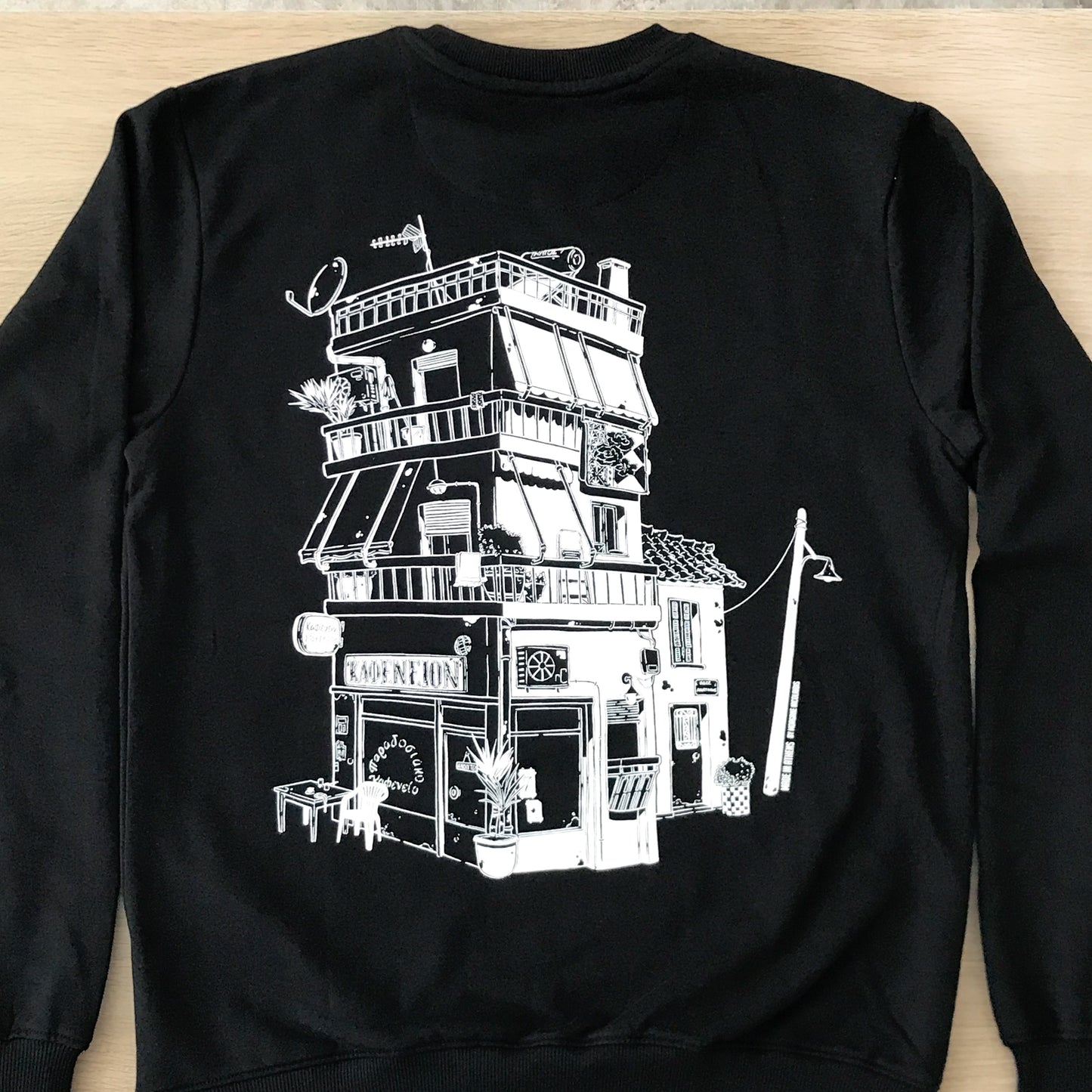 the back design of the sweatshirt.