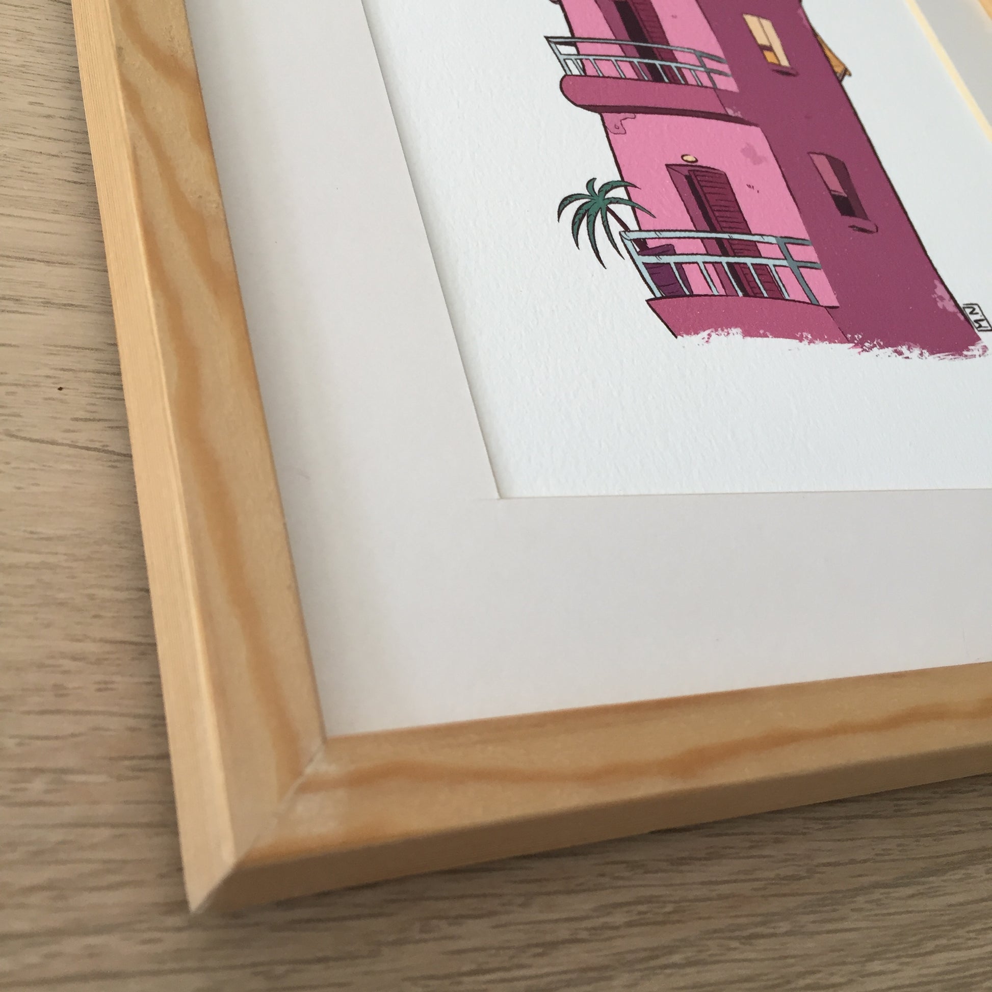 Close up of the handmade frame in pine wood.