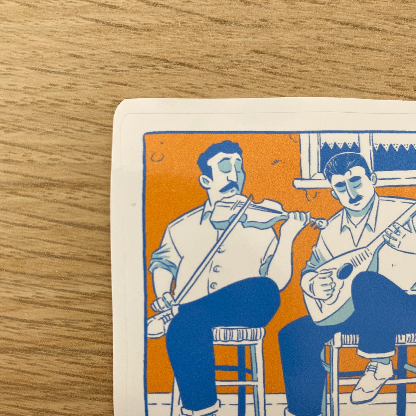 Zoom in of the top left corner of the sticker.
