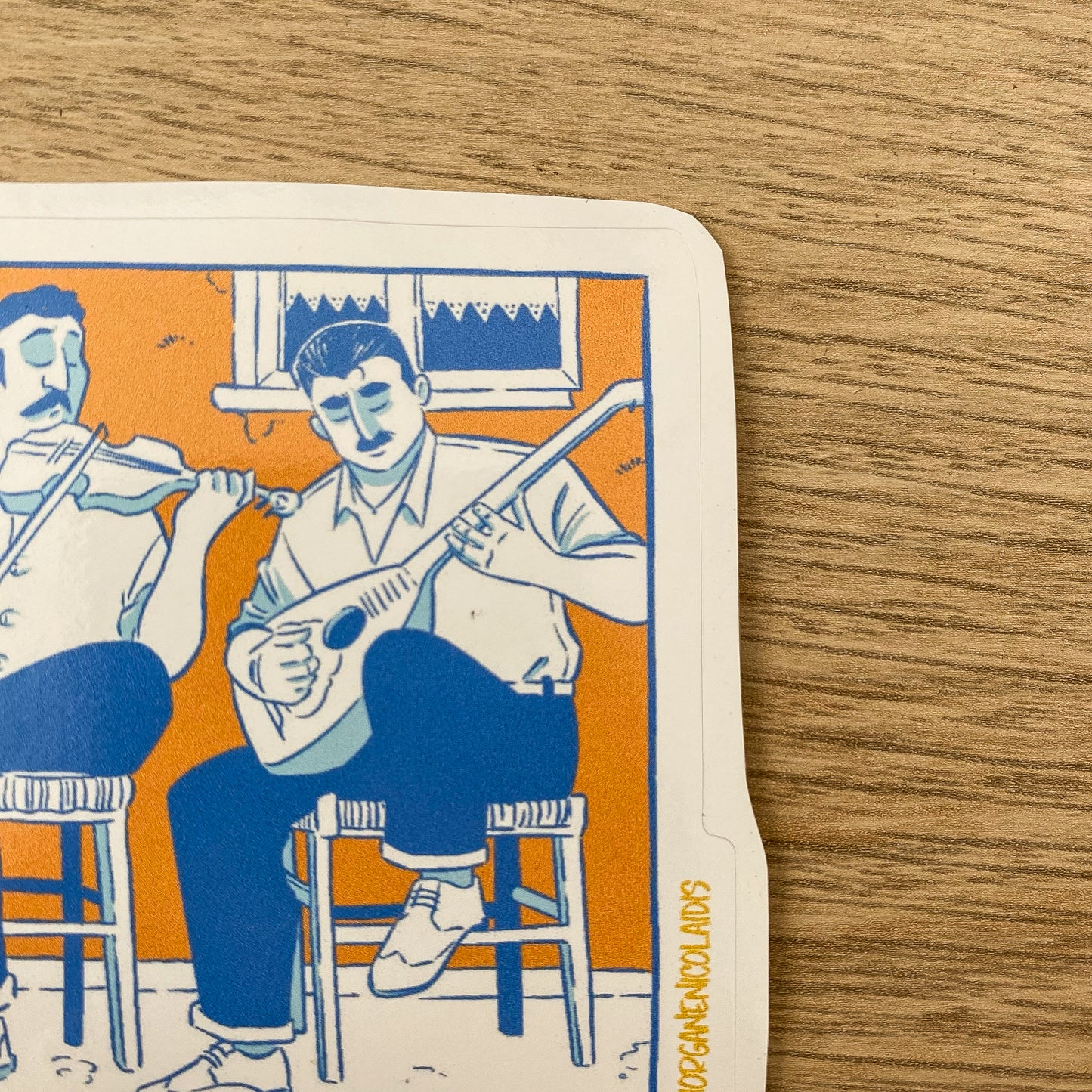 Zoom in of the top right corner of the sticker.