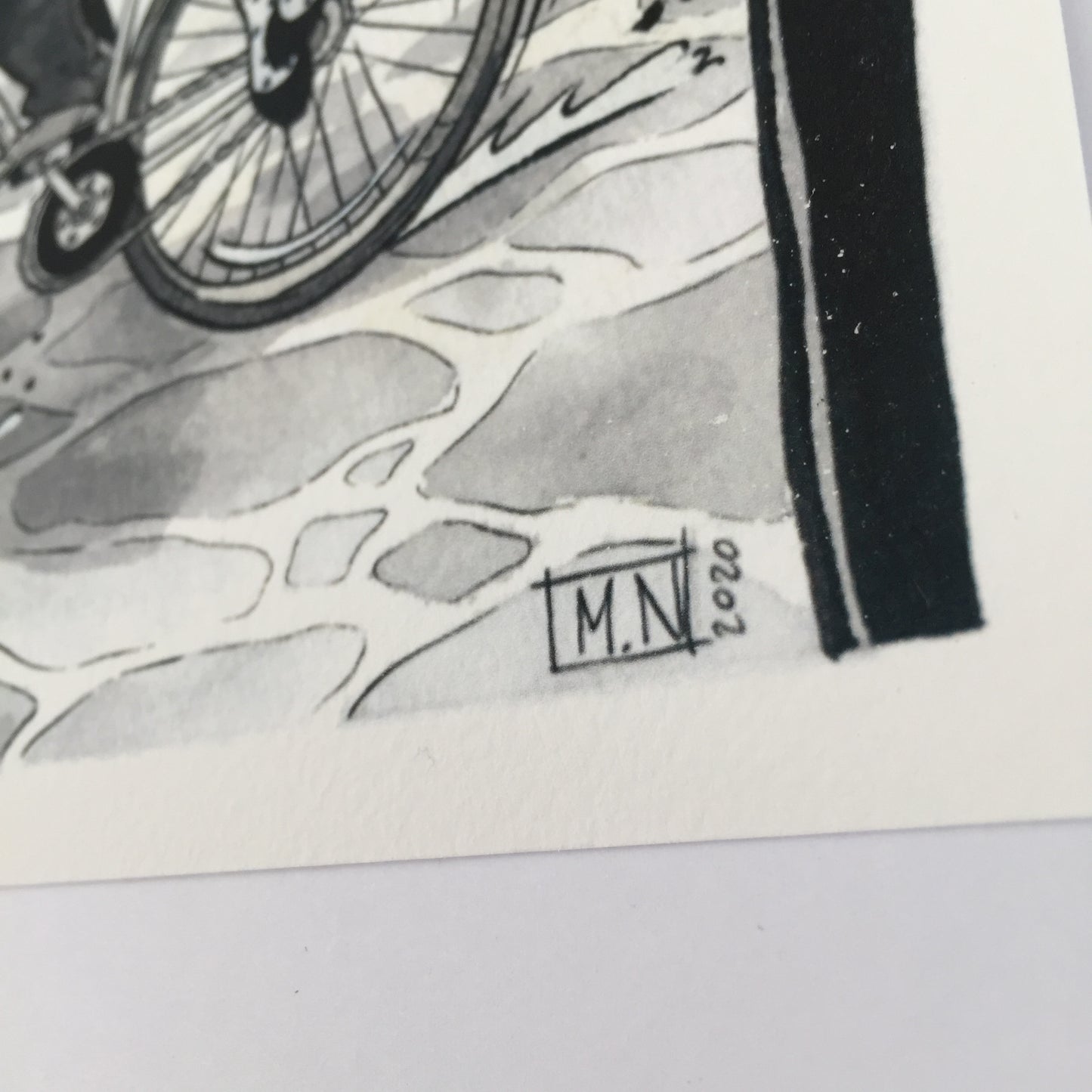 close up of the artist signature.