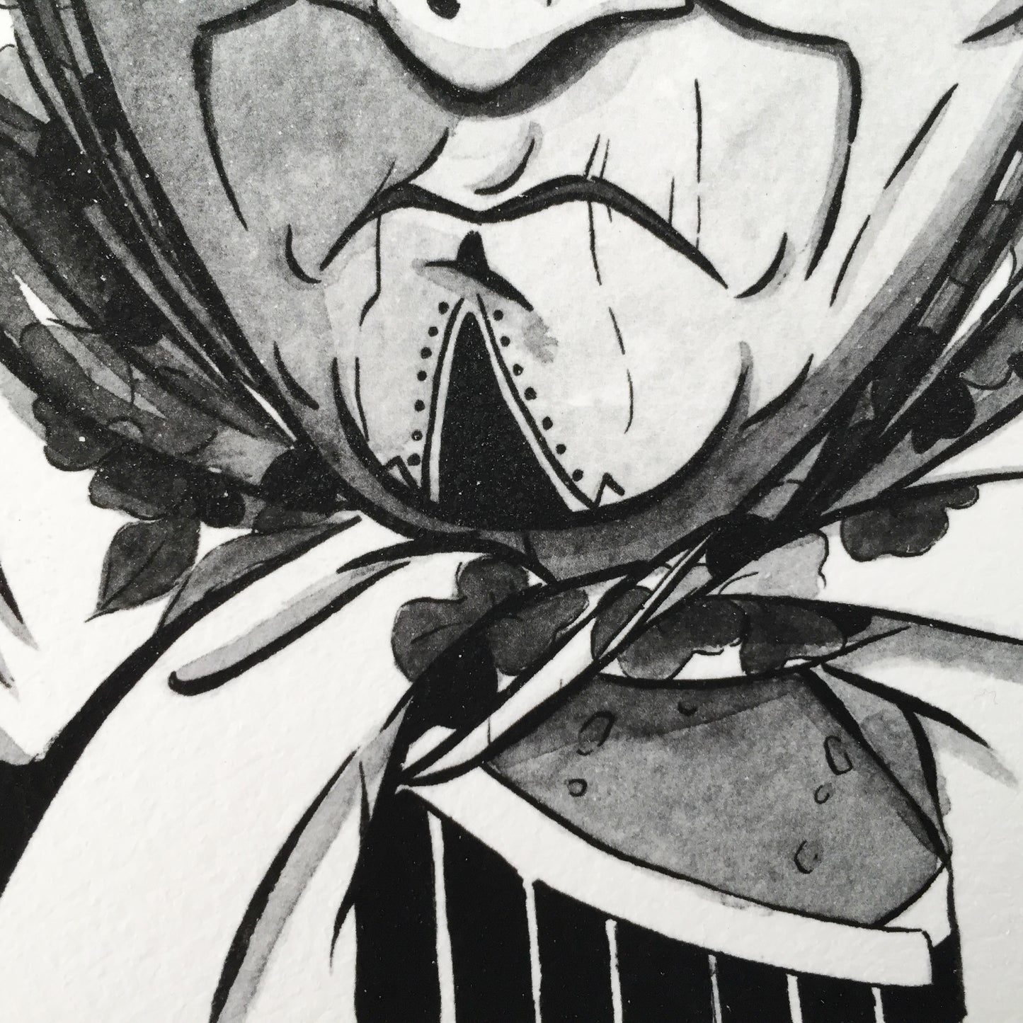 Other close up of the chin of the lady in the middle.