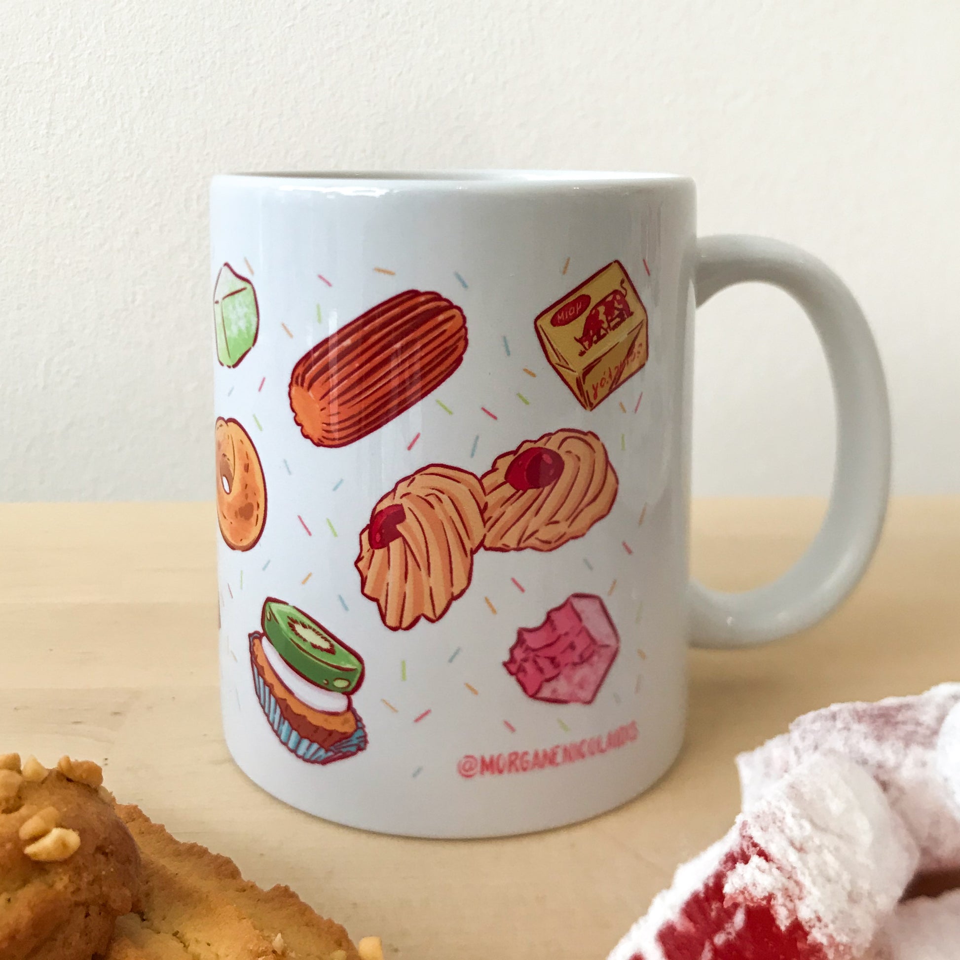mug with different greek sweets such as coconut biscuits, rose lukum, tartlet, fudge caramel, touloumba. 
